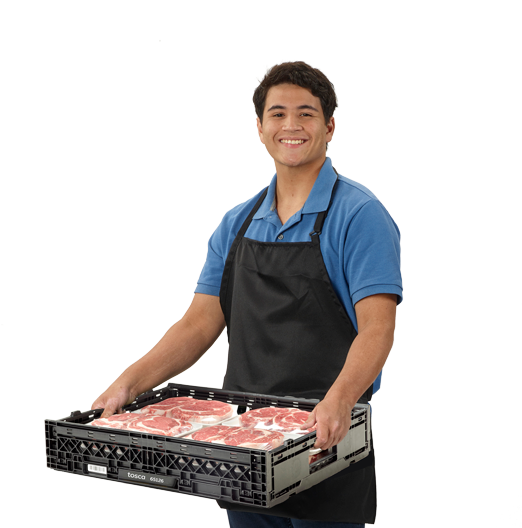 Man carrying meat in a reusable crate.