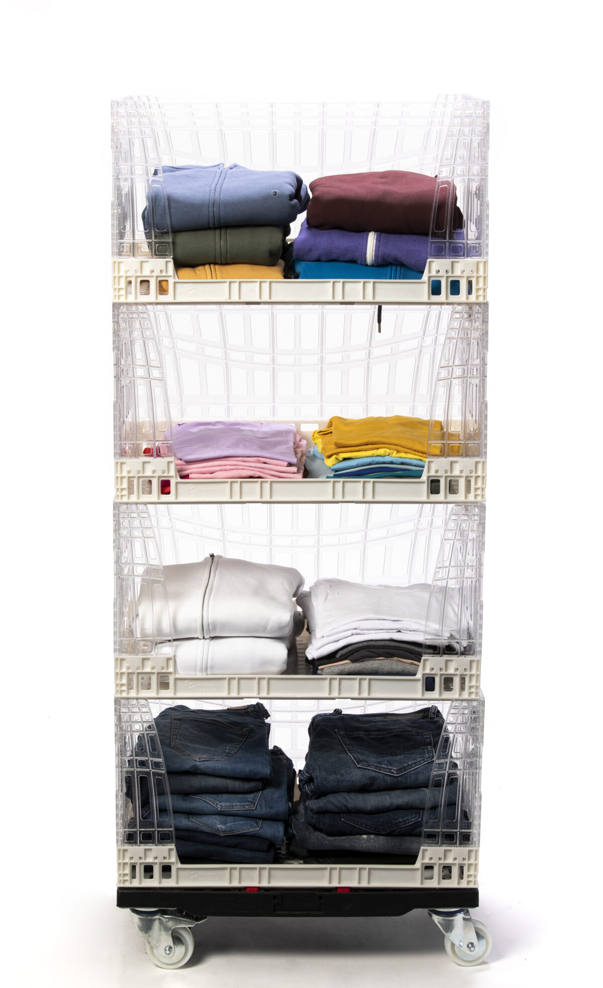 Folded, stacked garments are placed in Tosca Crystal Clear Crates Display on a portable dolly. This floor display uses retail-ready crates that are ideal for textile shipping and shopping visibility.