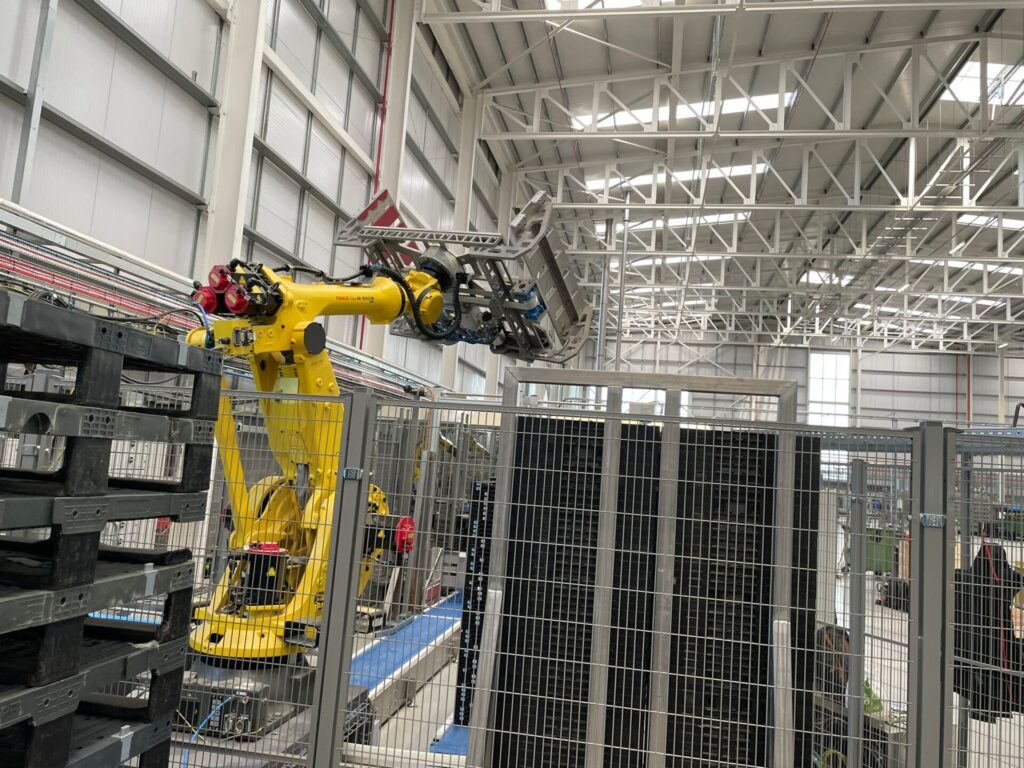 Automated arm facilitates speed on the wash line. Automated supply chains, Smart warehouse, innovative washing facility, Automated Logistics Systems, supply chain automation