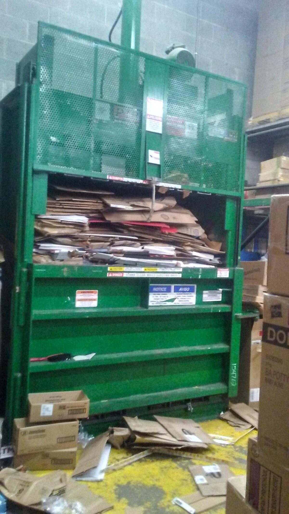 Messy Crate full of cardboard boxes