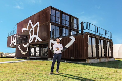 Frederico of Cultiva Farms stands in front of his farm