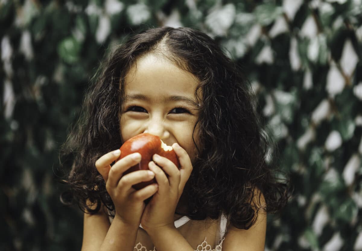 Girl eating apple