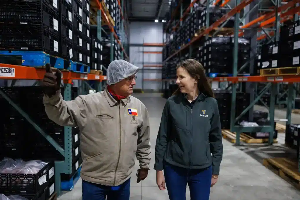 Randy deal from Brookshire Brothers talking to Alexis from Tosca in their warehouse